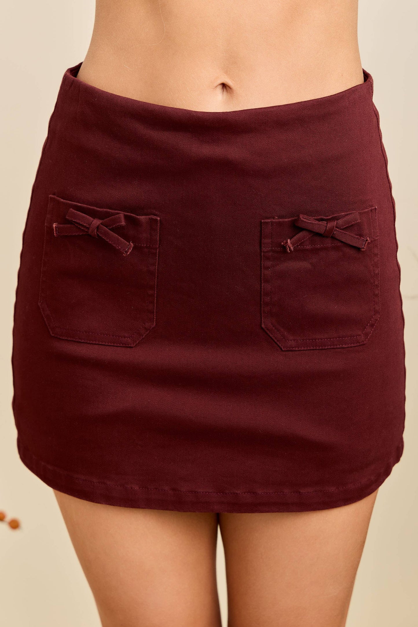 Garnet Mini Skort w/Front Pocket & Bow Trim