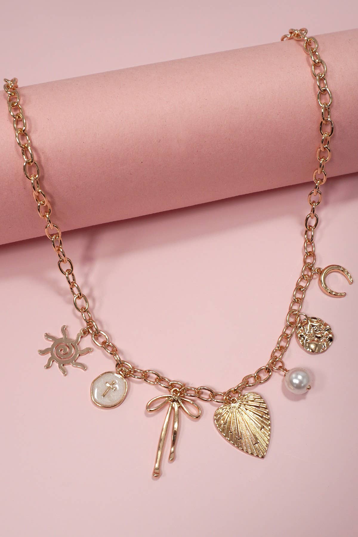 SUN BOW PEARL CROSS DISC U CHARM NECKLACE